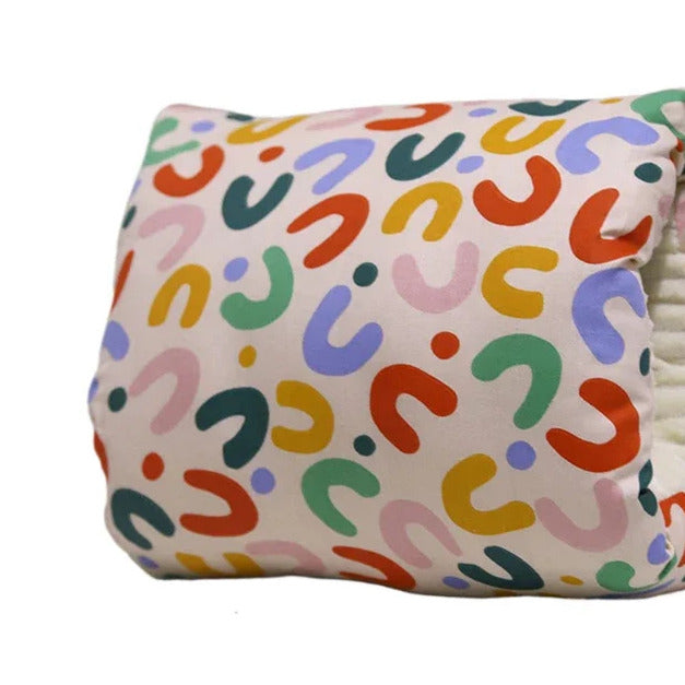 Coussin d’allaitement pour le bras coloré
